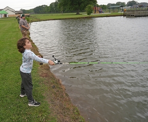 Child casting their line