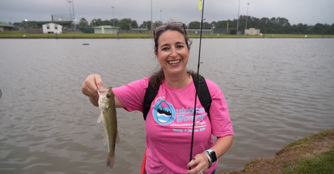 Woman holding a bass