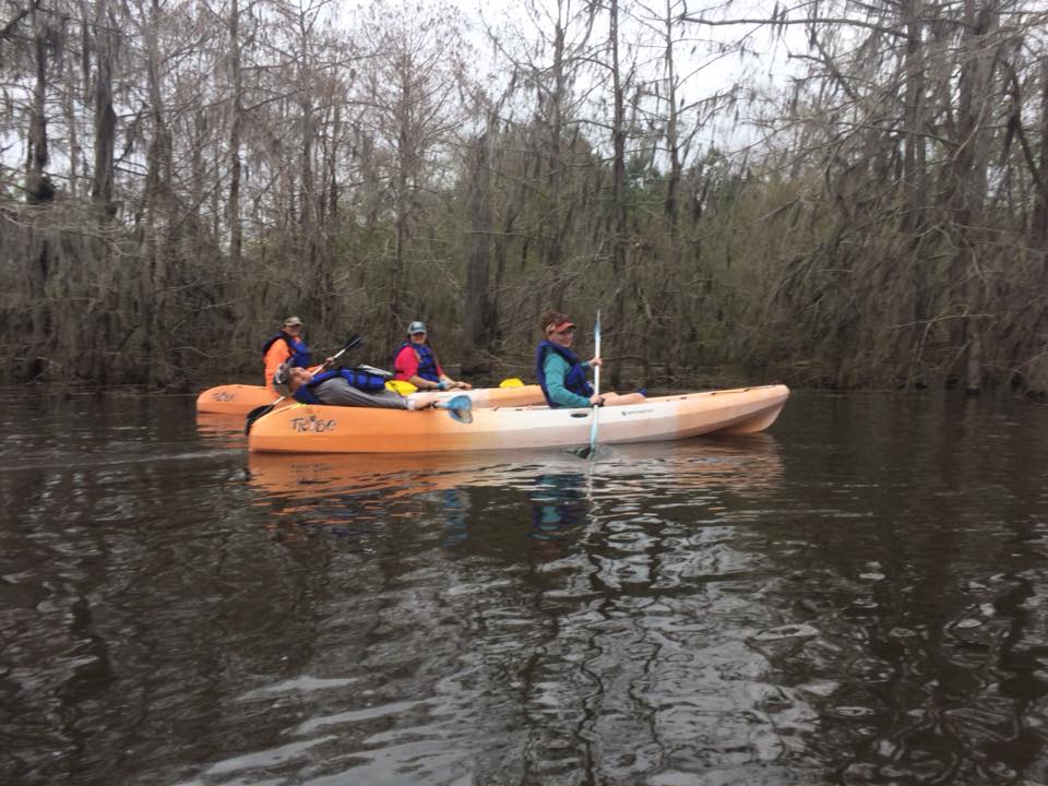 Women kayaking in lake