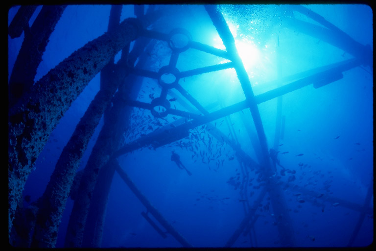 underwater image of an oil platform