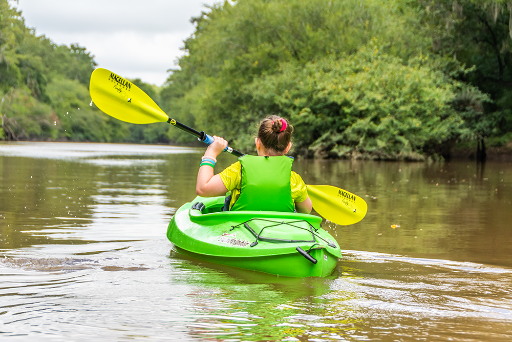 ladies paddling a kayak