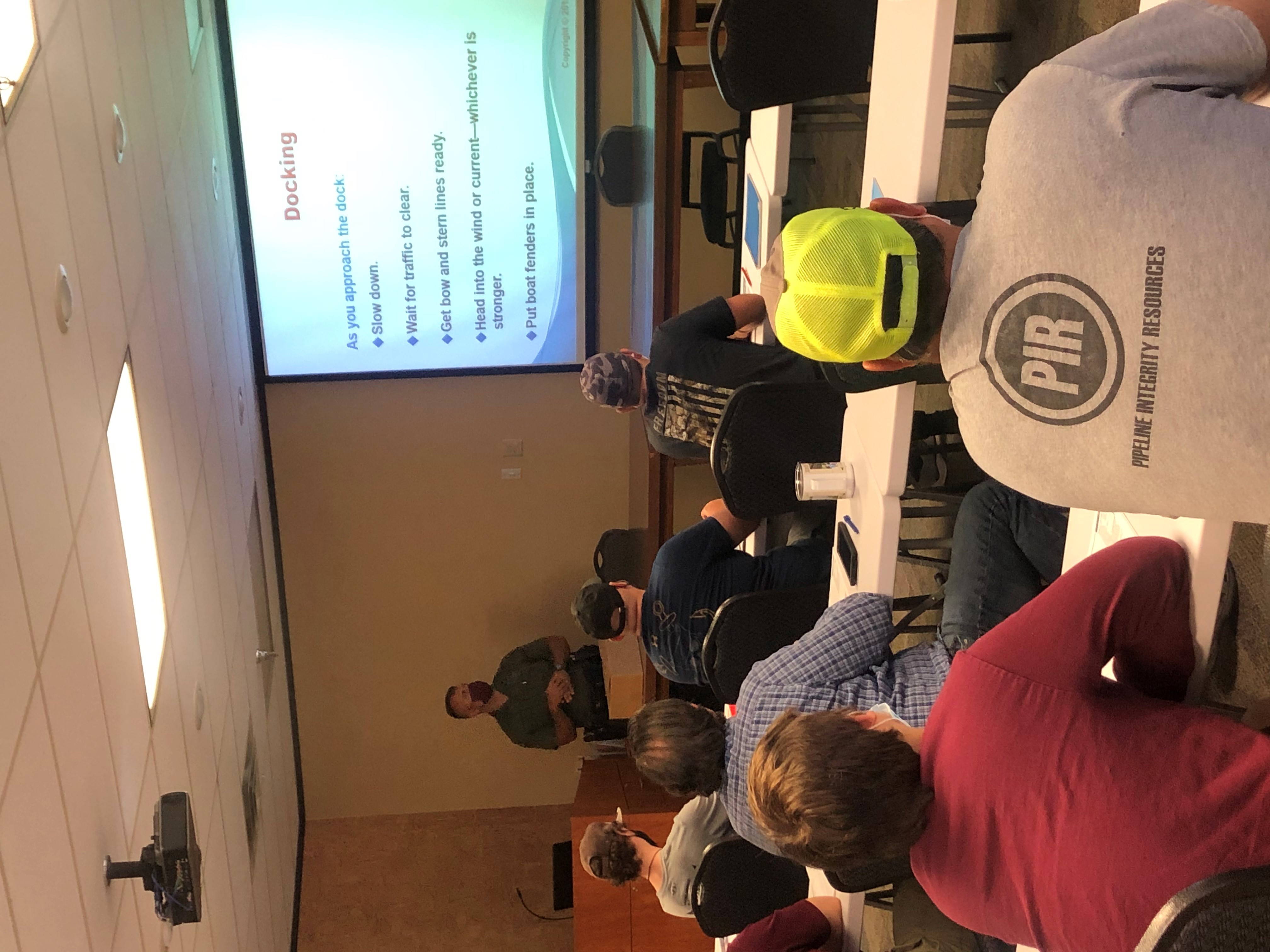 agent intructing a boater education class