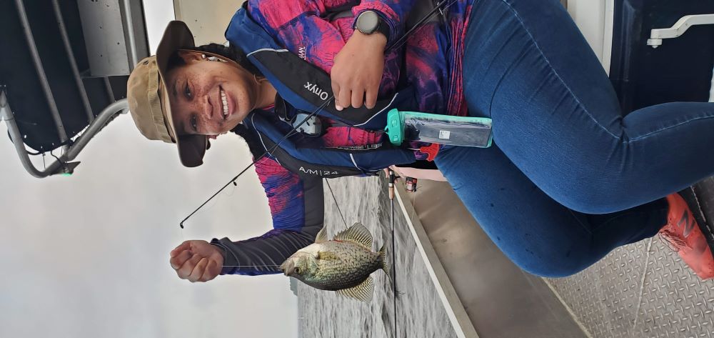 Participant shows off her catch during a Women’s Workshop weekend lottery trip. Participants are entered into the lottery after attending a Women’s Workshop 101 course