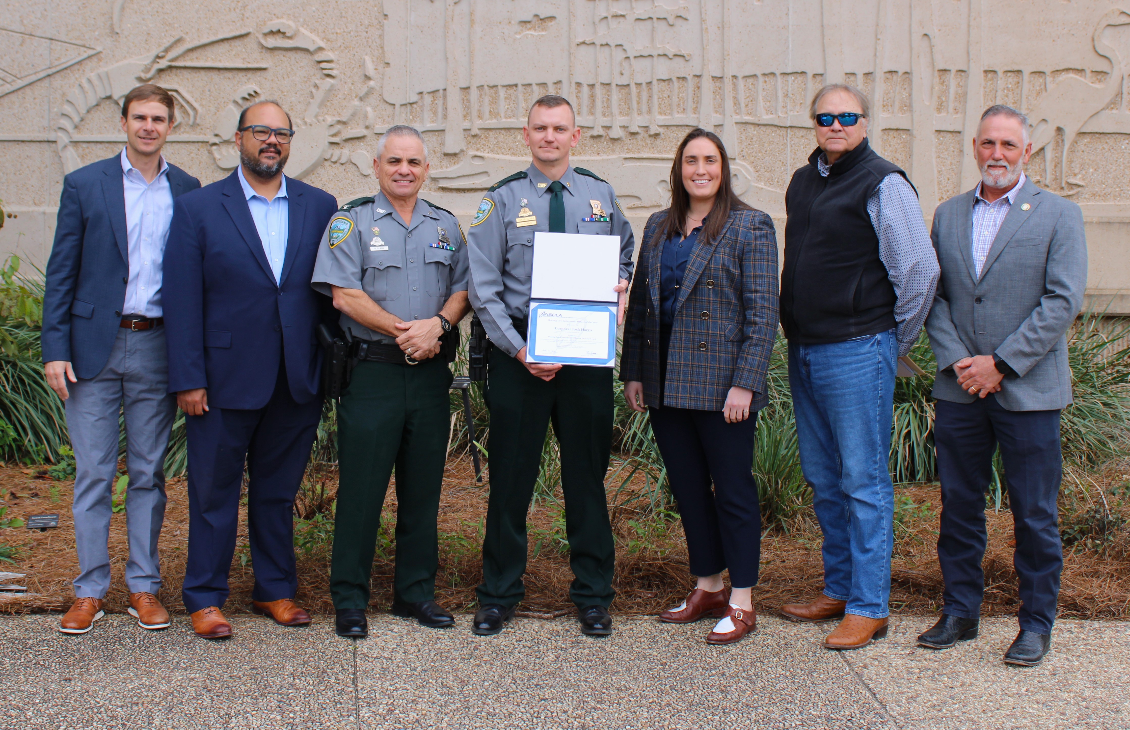 From left to right: Commissioner Jonathan Walker, Commissioner Brandon DeCuir, Col. Stephen Clark, Sgt. Joshua Harris, Secretary Madison Sheahan, Commissioner Harlie Reynolds and Commissioner Kevin Sagrera.