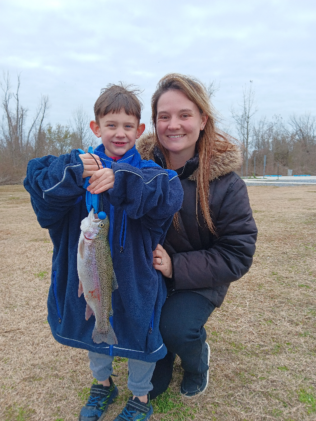 family holding fish