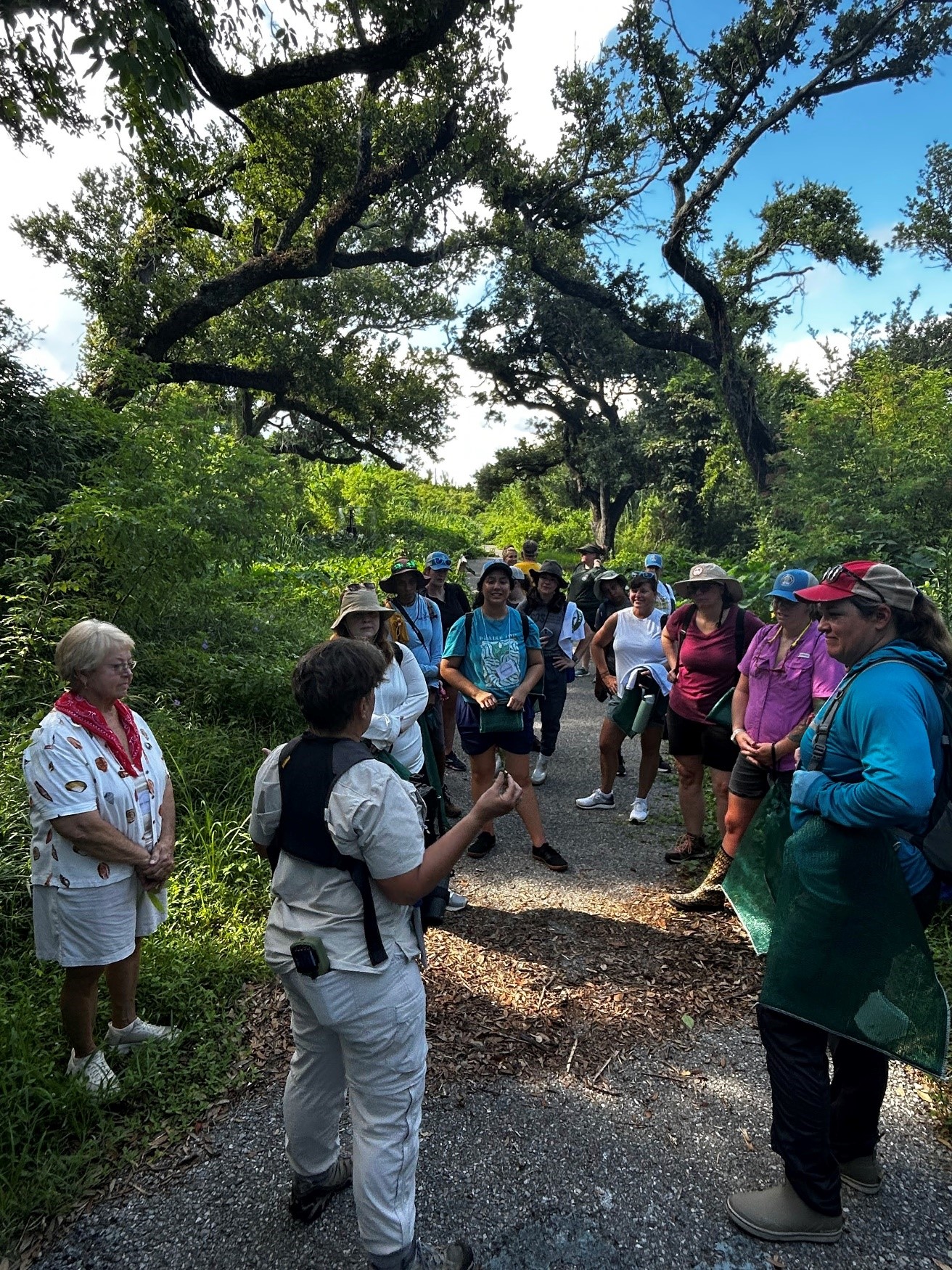 Instructor teach women about plants