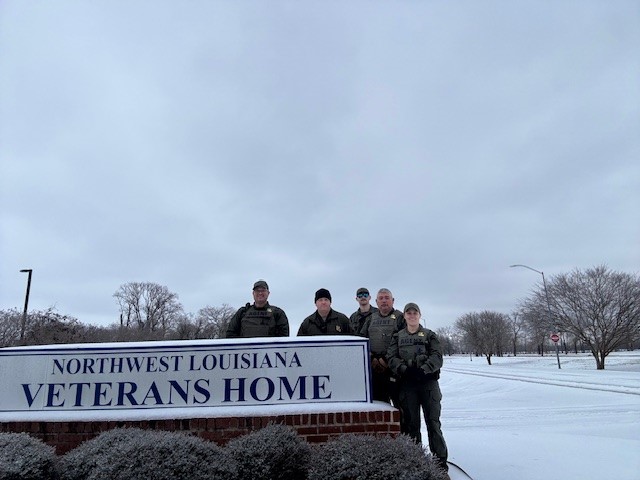 Enforcement Agents in front of Veteran Home