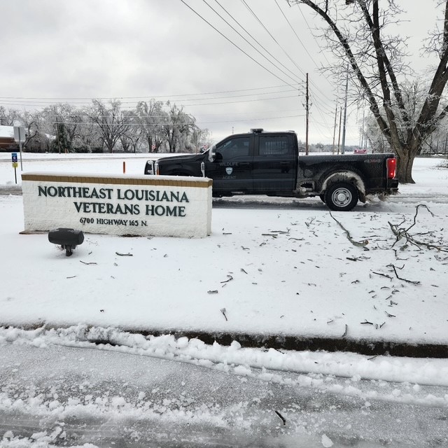 Enforcement Truck in front of Veteran Home