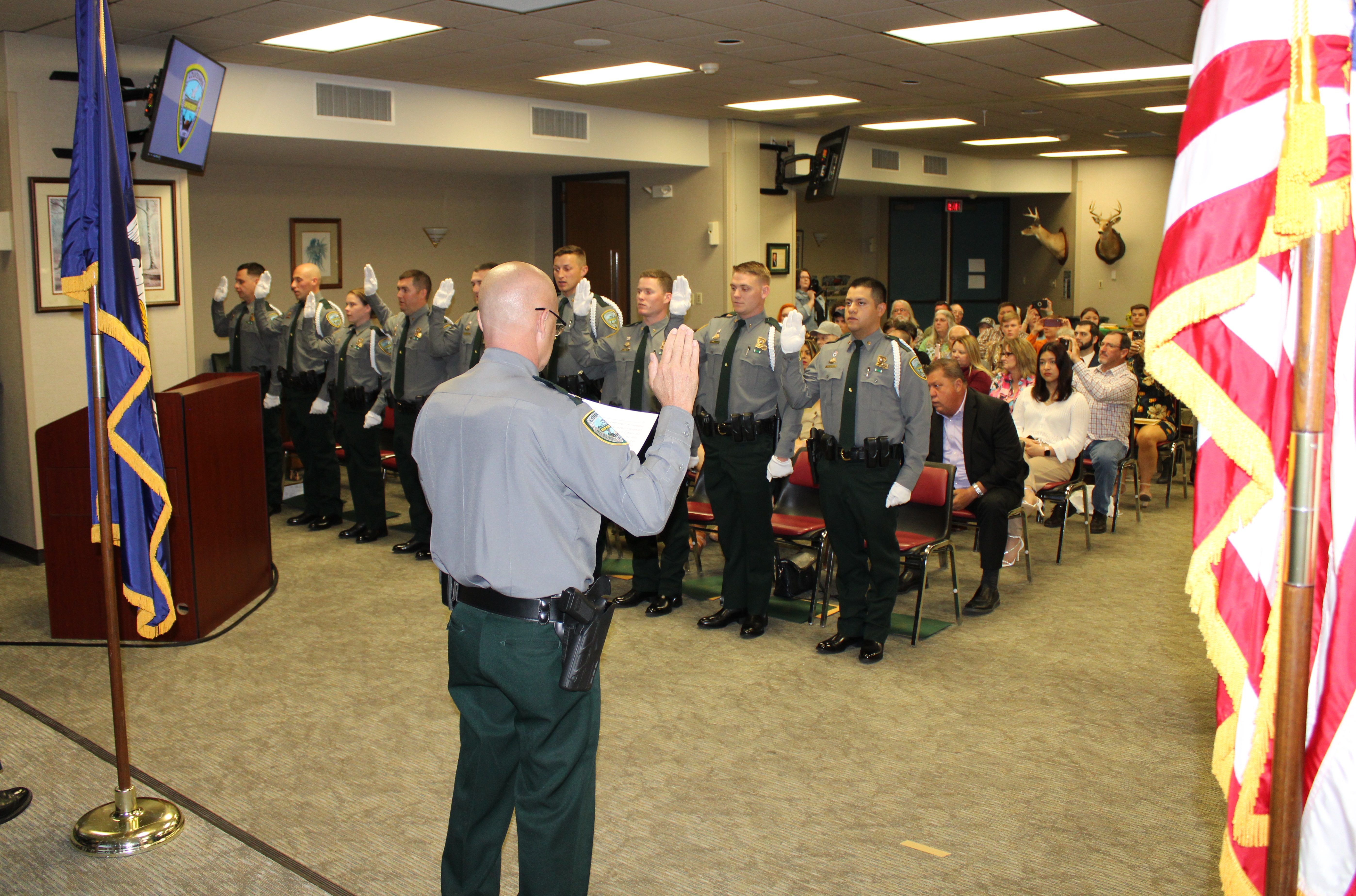 Col. Chad Hebert recited the Oath of Office to the graduating cadets