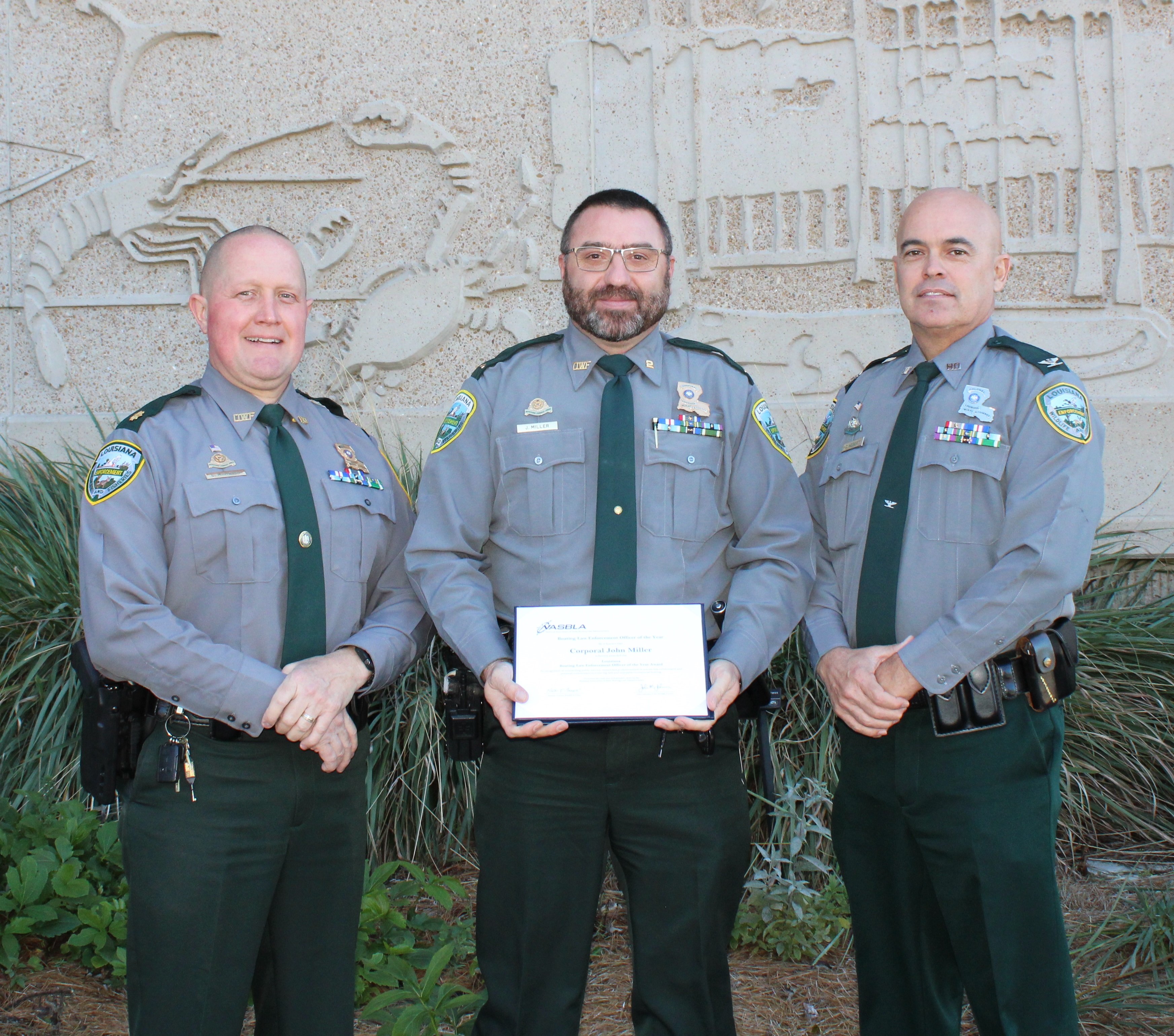 Major Clay Marques, Corporal John Miller, and Col. Chad Hebert