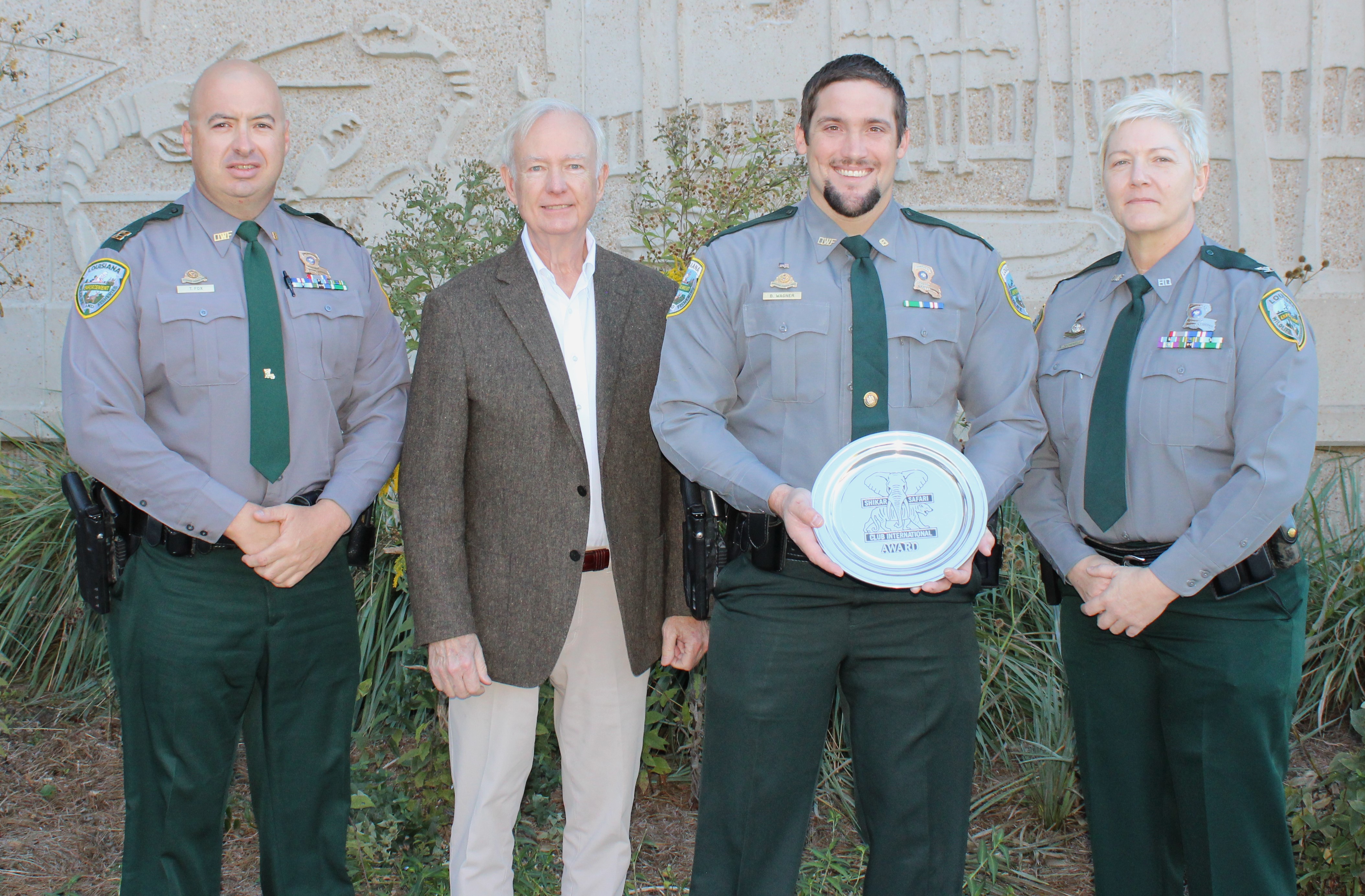 From left to right: Capt. Tim Fox, Shikar Safari Representative Lea Perez, Corporal Blaine Wagner and Colonel Rachel Zechenelly