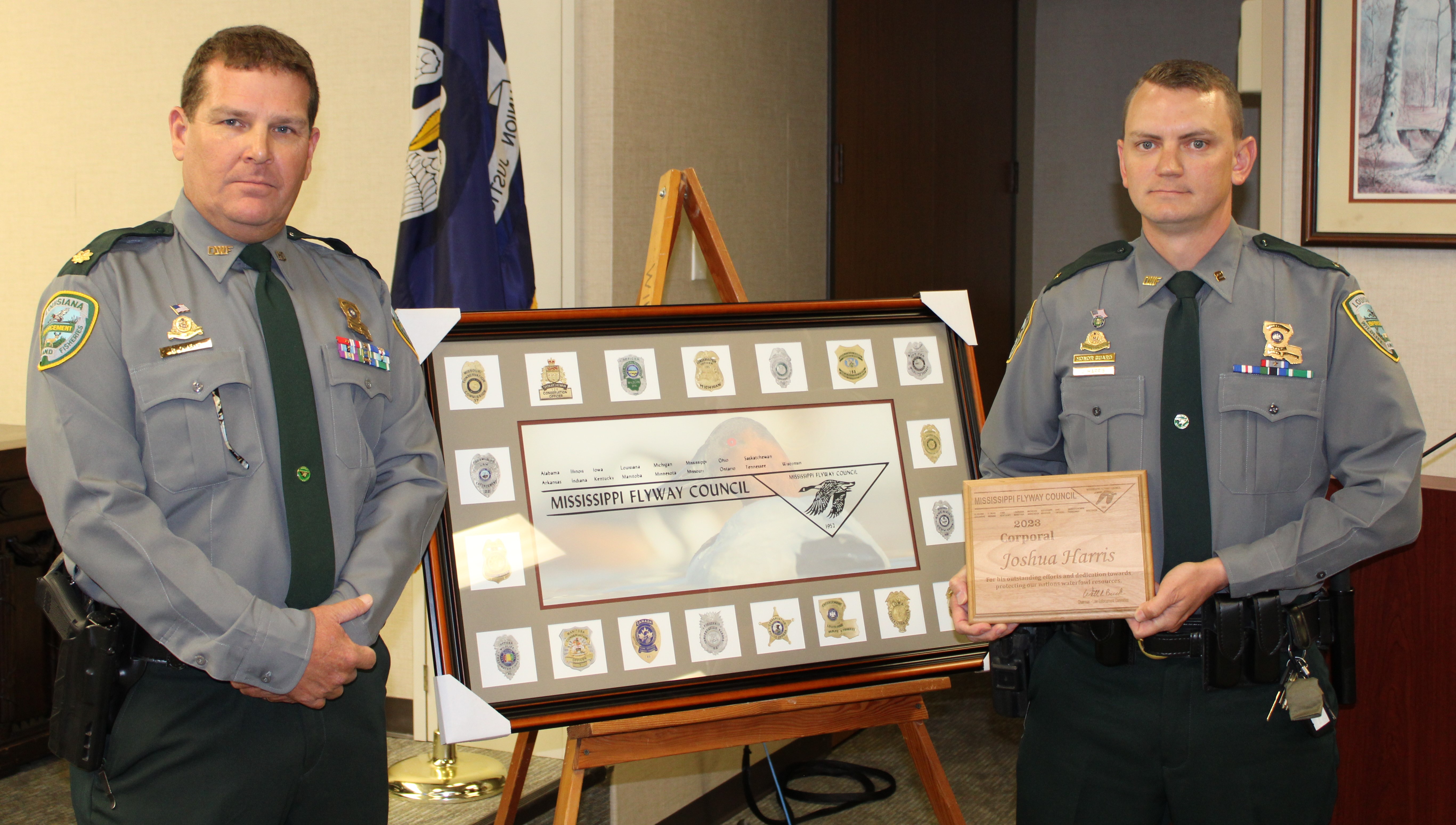 Major Rick Owens and Corporal Joshua Harris with award